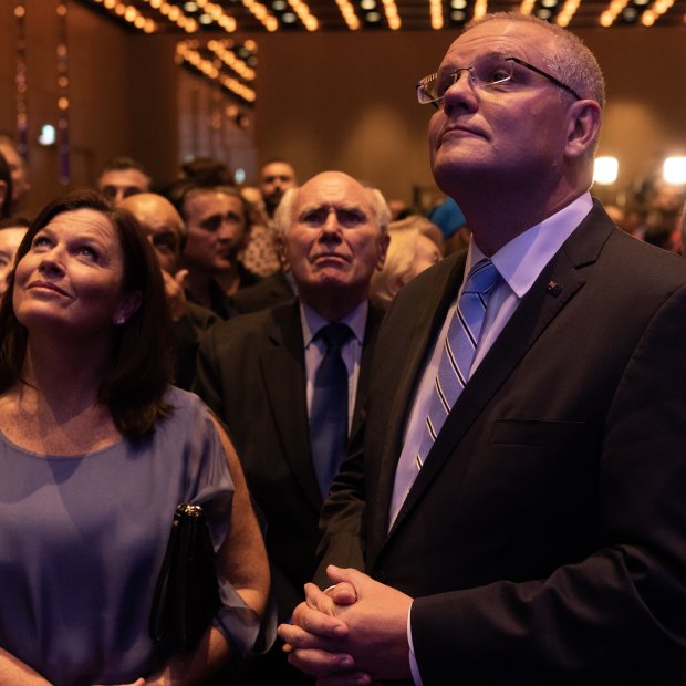 Prime Minister Scott Morrison and former prime minister John Howard watch Labor leader Michael Daley concede defeat in the Sofitel Wentworth on Saturday night.