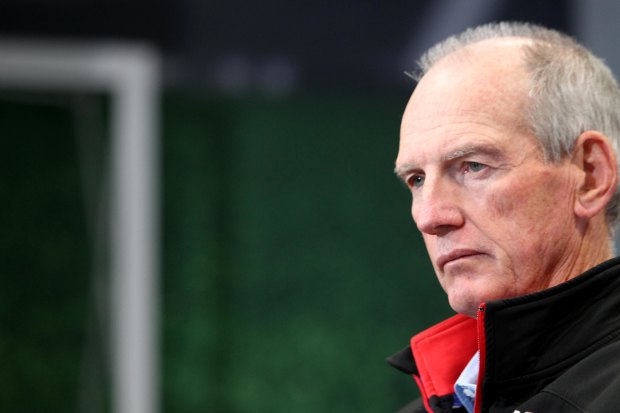Wayne Bennett eyes off the media during a tense press conference as Knights coach in 2014.