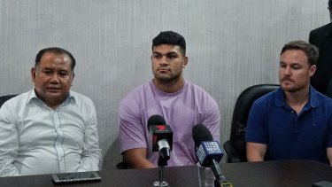 David Fifita (centre) speaks after being released from a Balinese prison flanked by lawyer Muhammad Rifan and Broncos staffer Adam Walsh.