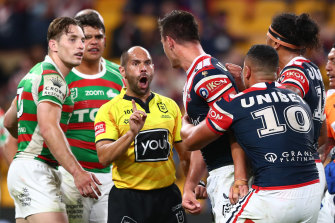 Roosters centre Joseph Manu confronts South Sydneyâ€™s Latrell Mitchell after the hit that broke his cheekbone.