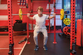 Physiotherapist Luke Pickett performing a squat.