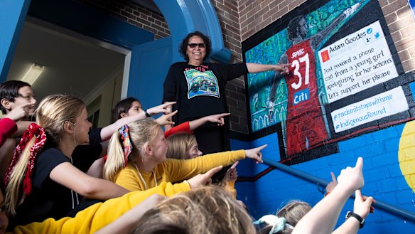 Indigenous artist Kathryn Dodd Farrawell calls out racism in an Adam Goods mural she painted at Vaucluse Primary School.