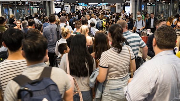 Commuters endure major overcrowding at Sydney's Town Hall station.