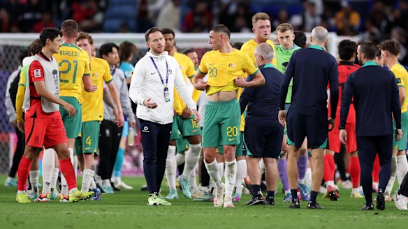 Lewis Miller stands dejected following defeat.