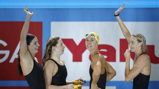 Mollie O’Callaghan, Madison Wilson, Meg Harris and Emma McKeon of Australia celebrate winning gold. 