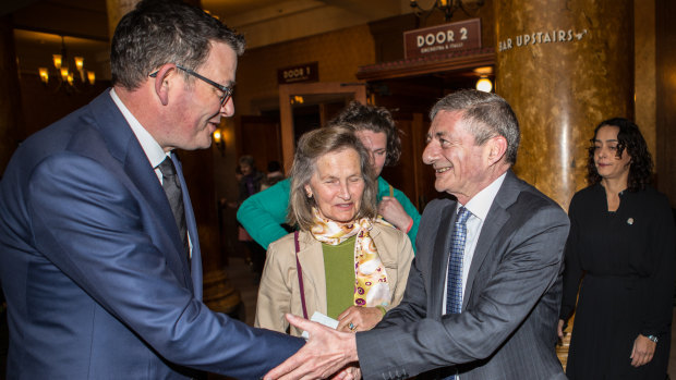 Premier Daniel Andrews, left and William Mora, son of the late Mirka Mora, at her State Memorial at the Palais Theatre. 