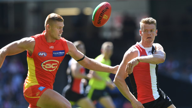 Up for grabs: Gold Coast's Peter Wright and St Kilda's Darragh Joyce battle for possession.