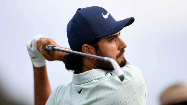 Moving day: Abraham Ancer of Mexico plays a shot from the 17th tee.
