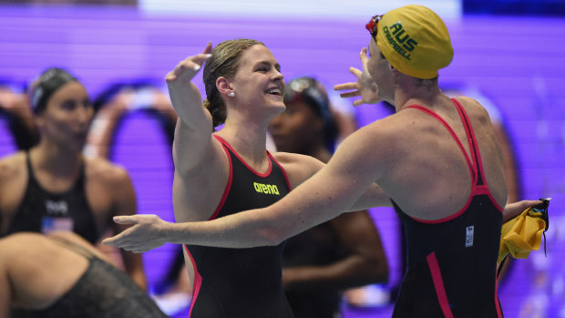 Gold rush: Shayna Jack celebrates victory with Cate Campbell.