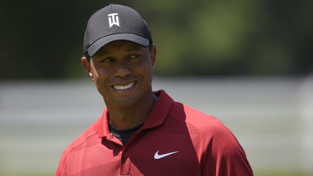 On the up: Tiger Woods finished tied for fourth in the Quicken Loans National.