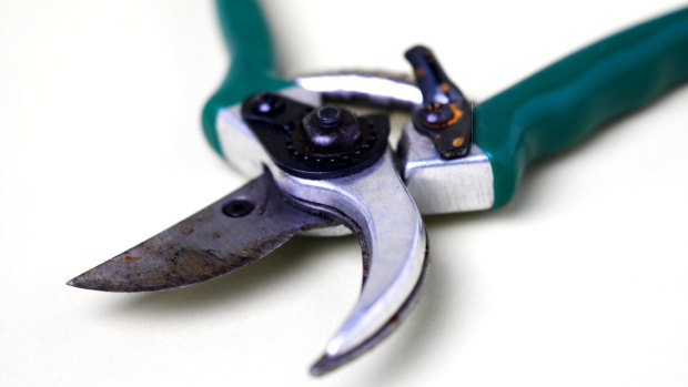 Two men allegedly wielded secateurs during an incident with a cyclist in North Melbourne on Thursday.
