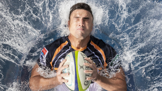 Tom Banks at the moment of impact for the Super Rugby guide photo shoot.