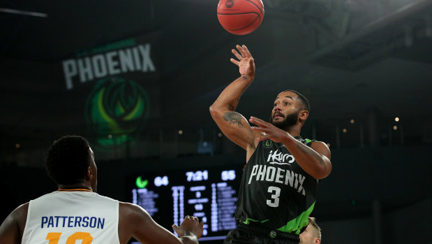 Shooting star: Phoenix import John Roberson in action against the Bullets at Melbourne Arena.