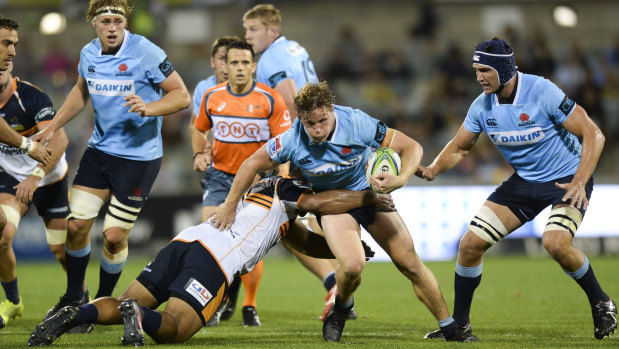 Grind: Michael Hooper led the Waratahs to a scrappy but solid victory at Canberra Stadium