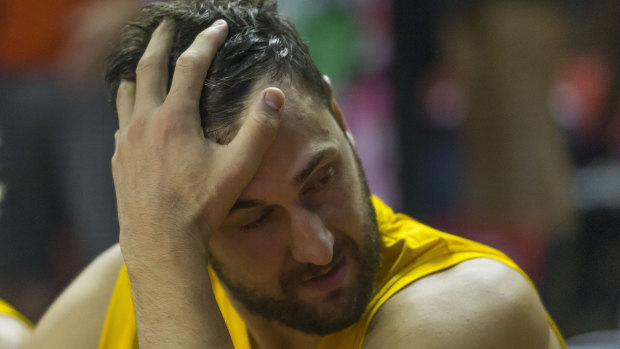 Bad day at the office: Andrew Bogut sweats it out on the Kings bench.