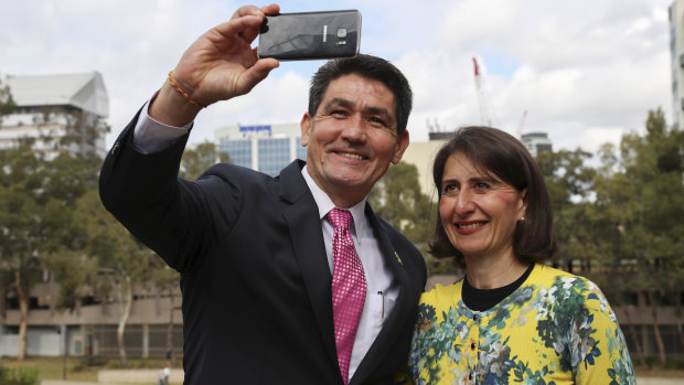 The member for Parramatta, Geoff Lee, takes a selfie with NSW Premier Gladys Berejiklian at an announcement of the site of the Powerhouse Museum in Parramatta on Saturday. 