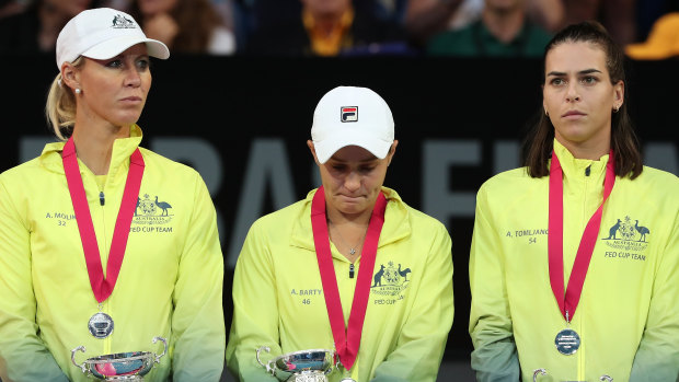 Alicia Molik, Ash Barty and Ajla Tomljanovic of Team Australia after the Fed Cup final.
