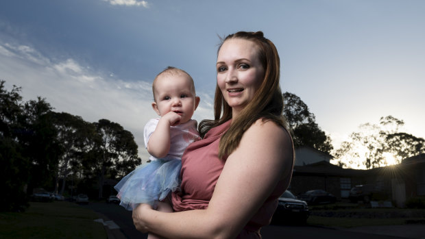 Laura Mehew with her nine-month-old daughter Tessa. She's "highly" unlikely to have a baby sibling any time soon.