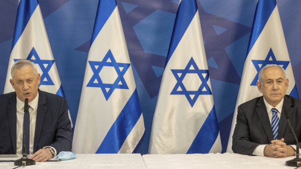 Israeli Prime Minister Benjamin Netanyahu, right, and Israeli Defence Minister Benny Gantz issue a statement at the Israeli Defence Ministry in Tel Aviv, Israel.
