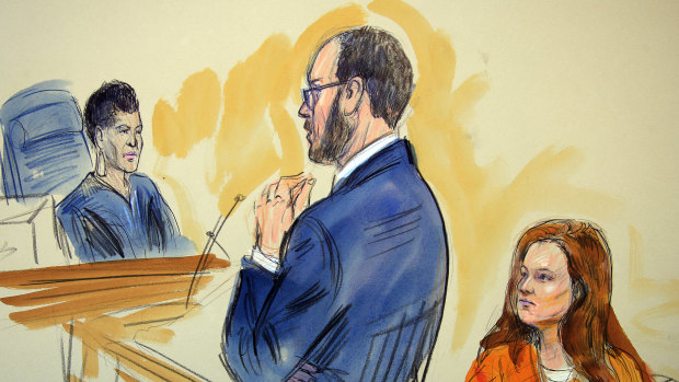 This courtroom sketch depicts Maria Butina, a 29-year-old gun-rights activist suspected of being a covert Russian agent, listening to Assistant U.S. Attorney Erik Kenerson as he speaks to Judge Deborah Robinson, left, during a hearing in federal court.
