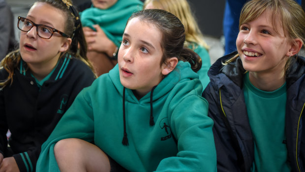 Students from Yarra Primary and Collingwod College listen to soprano Georgia Wilkinson sing.