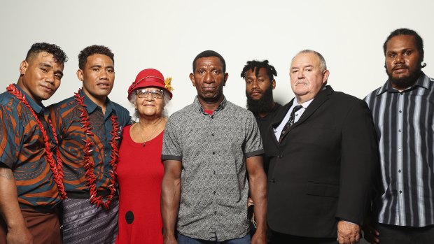 Seasonal workers Aleki and Talipope, missionary Jane Smith, worker Lazare Mankon, worker Moses, missionary Geoffrey Smith and worker Sergio, after they spoke at a Senate hearing about Pacific Island workers at Parliament House.
