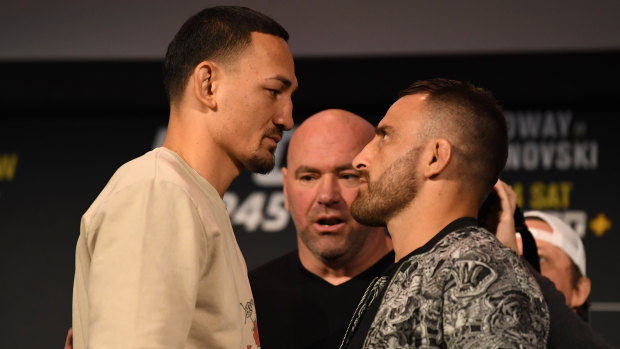 Max Holloway (left) and Alexander Volkanvoski face off during a UFC 245 press conference at Madison Square Garden.
