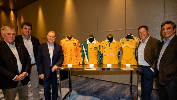 (L-R) Bob Dwyer, Tim Gavin, David Campese, Phil Kearns and Gary Ella pose with vintage Wallabies jerseys. 