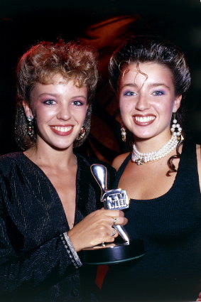 Three Aussie icons: while we wait for today’s photos to roll in, a throwback to Kylie and Dannii Minogue with Kylie’s silver Logie (for most popular actress) in 1987.