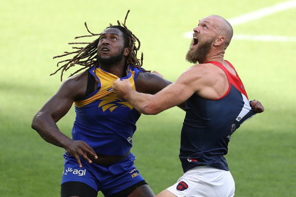 Nic Naitanui and Max Gawn contest the ruck during round one. 