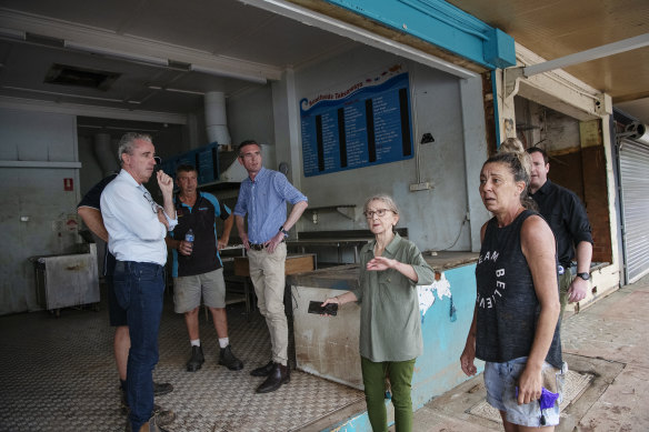 Federal Member for Page Kevin Hogan, NSW Premier Dominic Perrottet and Lismore MP Janelle Saffin visit Southside Hot Bread bakery in South Lismore after severe flooding devastated the town in northern NSW.