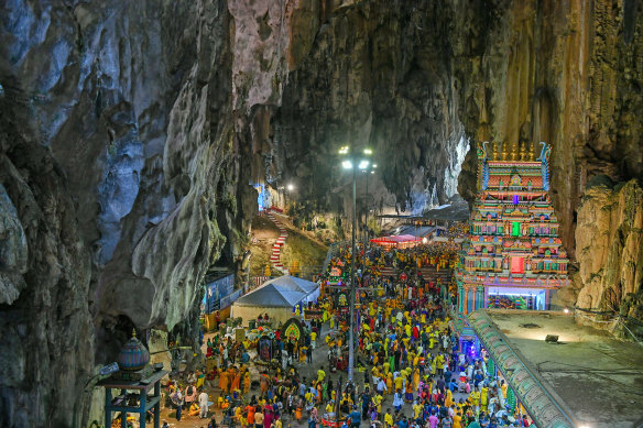 The Batu Caves house a Hindu temple, statues and frescoes.