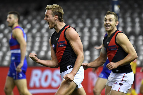 Darcy Parish relishes the moment after scoring.