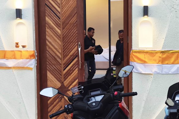 Police inside the luxury villa where the ambush unfolded in Badung, Bali.