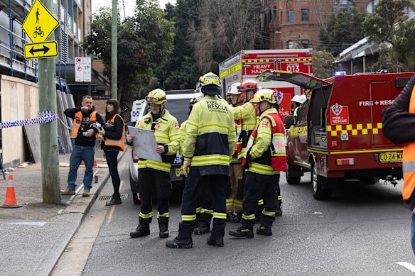 Emergency services at the site of the building collapse.