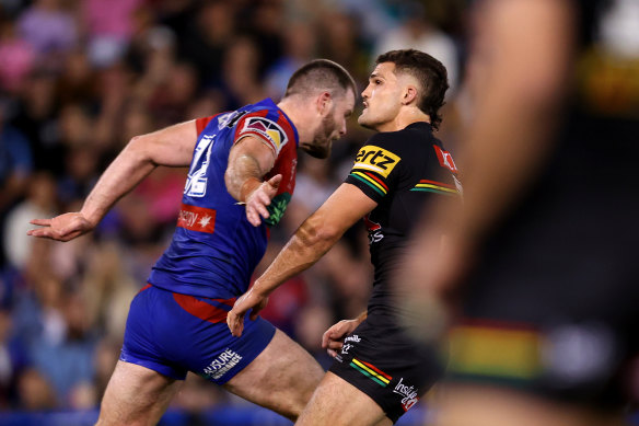 Lachlan Fitzgibbon takes out Nathan Cleary after a kick.