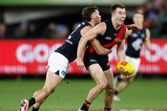 Hang on: The Blues were able to quell Zach Merrett, but the Essendon skipper needs to get moving if his team is to push for a top-four finish.