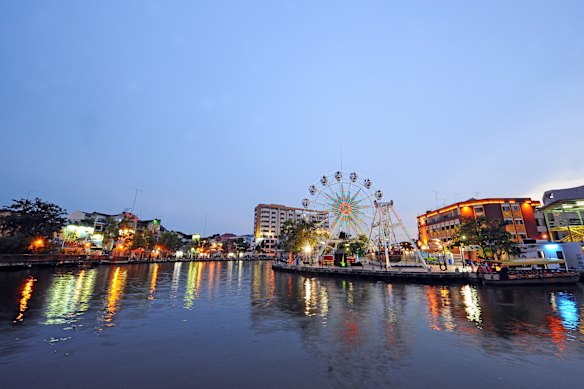 Melaka River cuts across the city.