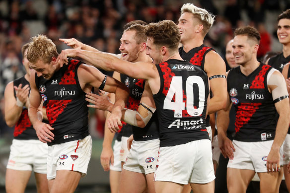 Darcy Parish (left) is congratulated after winning the Anzac Medal this year.