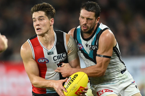 Travis Boak applies the pressure to Liam Stocker.