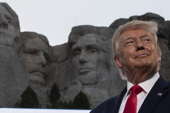 President Donald Trump smiles at Mount Rushmore National Memorial in South Dakota on July 3.