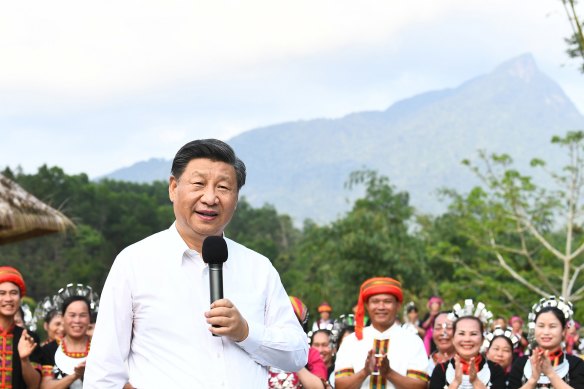 Xi visits villagers in Hainan province in April 2022 to inspect projects tackling poverty and rural rejuvenation.