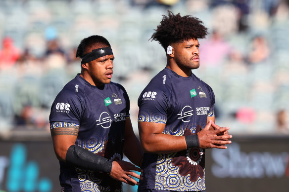 Allan Alaalatoa and Rob Valentini warming up ahead of the Brumbies’ clash with the Chiefs.