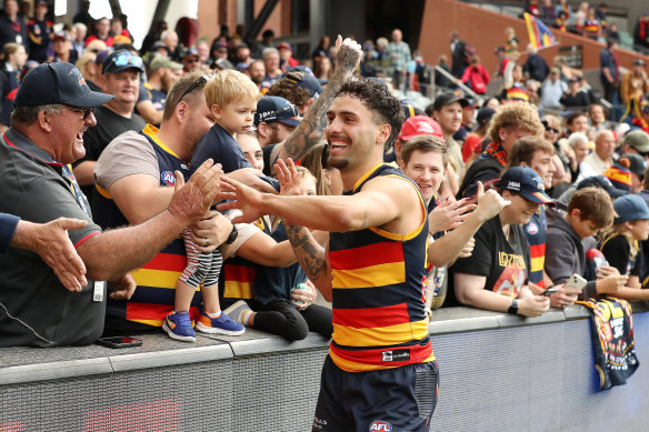 Izak Rankine gets up close and personal with Adelaide Crows fans.