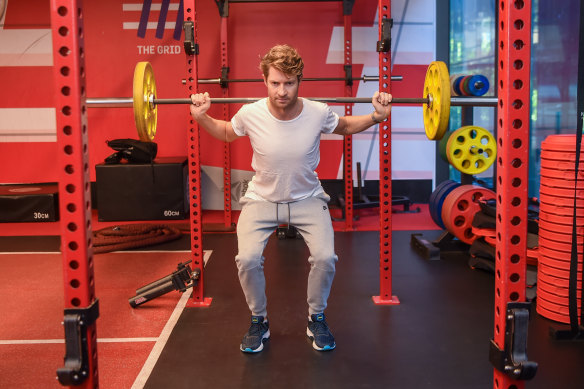 Physiotherapist Luke Pickett performing a squat.
