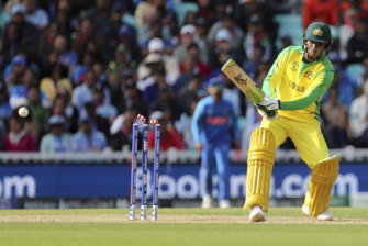 Australia's Usman Khawaja is bowled by India's Jasprit Bumrah.