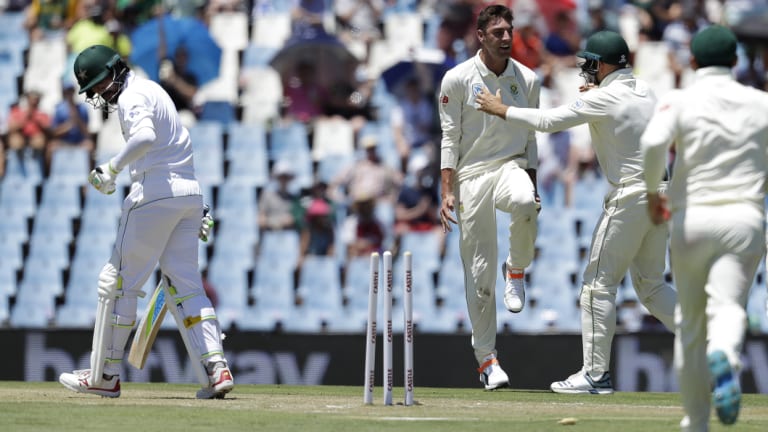 South Africa's Duanne Olivier (centre) celebrates after bowling out Pakistan's Mohammad Amir (left).