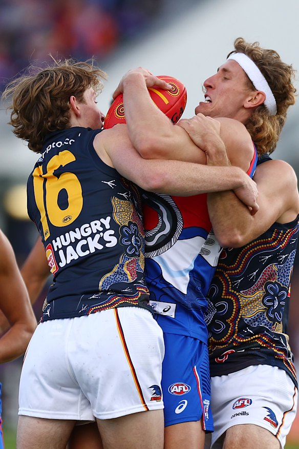 Aaron Naughton in a tangle.