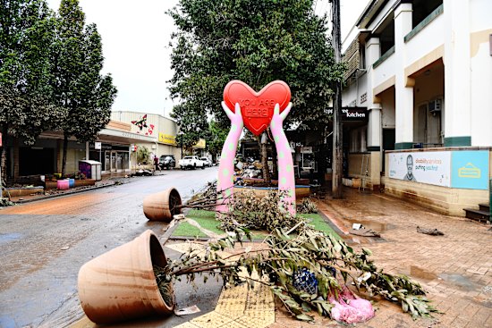 A Lismore street, days later: the piles of detritus, gathered by helpers and volunteers, reflect “the community spirit manifesting in this trauma”, notes local John Stewart.