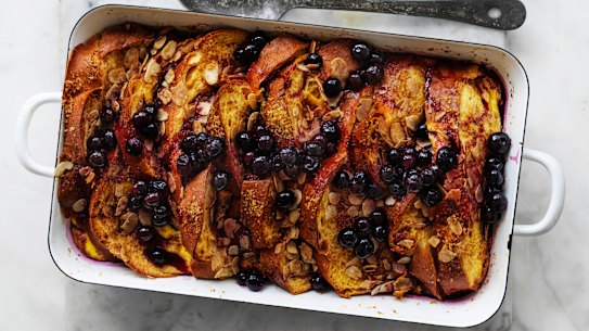Baked french toast with almond and blueberry maple sauce.